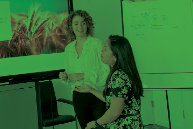 Two women giving presentation